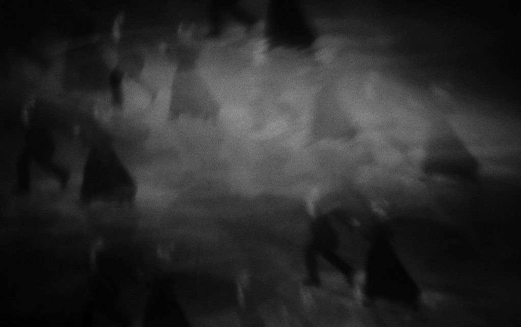 Ghostly dancers, soft focus, a smoke-filled dance floor.